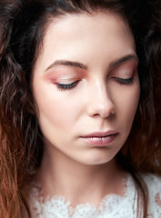 Obraz premium Close-up portrait of beautiful young girl with closed eyes