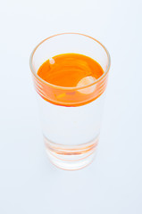 Sea buckthorn syrup in glass close up