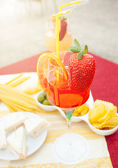 Cocktail glasses on table at outdoor.