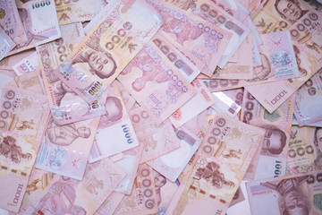 Close up Thai money banknotes closeup background, Thailand money for business, coins. 1000 task butts