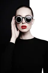 beautiful young woman with black sunglasses © Egor Mayer