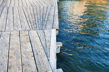 Old wooden texture background of sea pier. Sea Bridge.