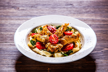 Pasta with meat, sauce and vegetables