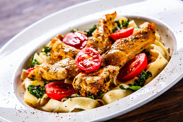 Pasta with meat, sauce and vegetables