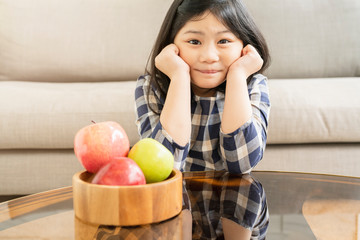 pretty happiness smiling asian girl kid with fresh apple healthy food ideas concept