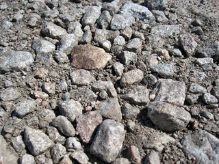 Stone road background. Gravel.