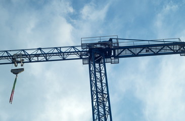 Industrial crane details on the sky