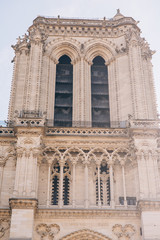 Fototapeta premium Architectural fragments of Reims Notre-Dame cathedral. Notre-Dame de Reims Cathedral Our Lady of Reims, 1275 is Roman Catholic Church in Reims. France.