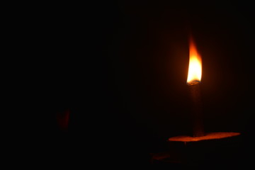 light candles in the middle of the darkness