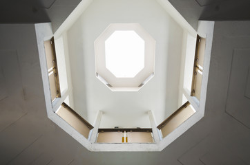 Octagon photomending symmetry in a building with light input architectural lines