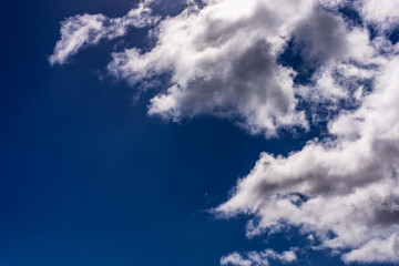 Blue sky with white clouds high contrast, cumulus