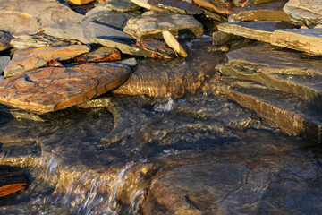 Water running over rocks