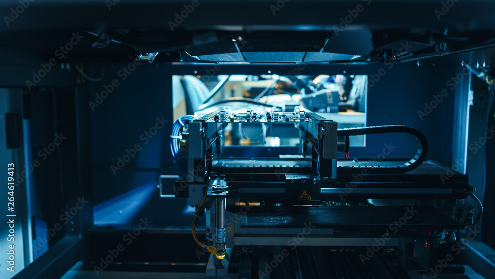 Aufkleber automated robotic industrial equipment is testing electronic printed circuit board with light and la