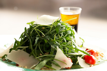 salad with arugula parmesan and cherry