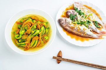 Chinese dish steamed red shirt fish and fried pumpkin flower