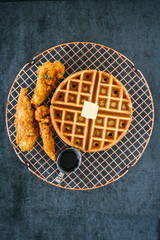 Chicken and Waffles on Dark Background
