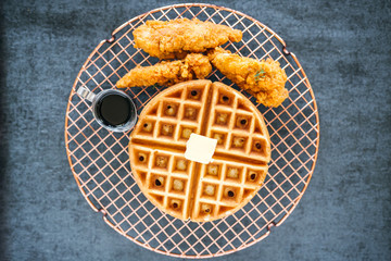 Chicken and Waffles on Dark Background