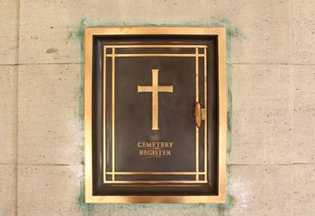 Cemetery register for Royal Air Force soldiers during World War II. Berlin, Germany. On the wall, before entering the cemetery.