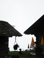 House and gazebo in the mountains in the Alps in the summer.