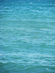 Blue azure calm background waves sea ocean.