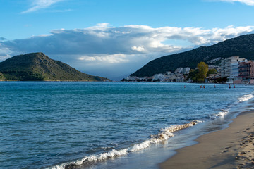 Small town Tolo, located near Nafplio in cozy sea bay with clear water and fine sand, summer vacation destination for families with kids