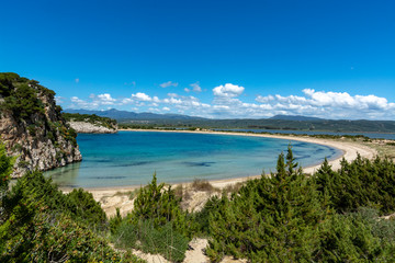 Voidokilia Beach, popular white sand and blue clear water beach in Messinia in Mediterranean area in shape of Greek letter omega, Peloponnese, Greece.