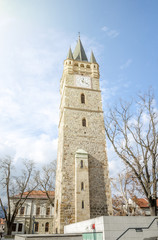 Fototapeta na wymiar Saint Stephen's Tower in the Center of Baia Mare city in the historic Maramures Romanian area built in neo-gothic style, it used to be a bell tower but was later modified into a clock tower