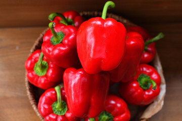 Colourful peppers, red, yellow and green.Their name are bell pepper, sweet pepper or capsicum.Vegetables in a basket, organic food and fresh vegetables.