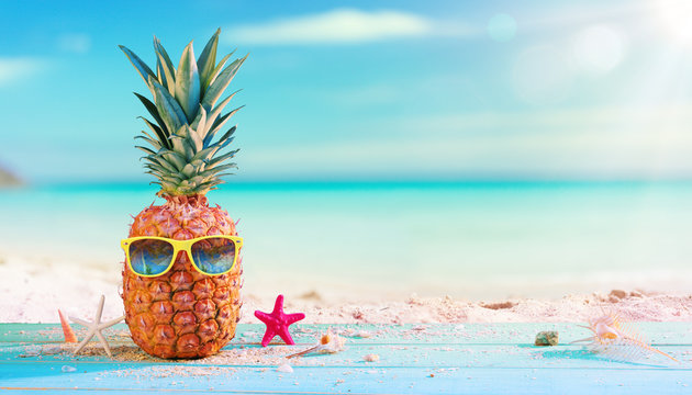 Pineapple With Sunglasses In The Beach - Powered by Adobe