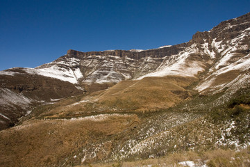Landscape of Sani Pass, Drakensbergen in South-Africa. After rare snow storm.