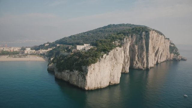 Aerial shot of the Montagna Spaccata or Broken Mountain in Gaeta, Italy