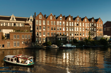 Cityscape of a canal in Amsterdam, capital of the Netherlands