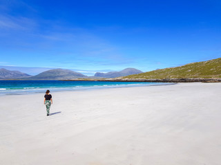 Girl on a white sandy beach