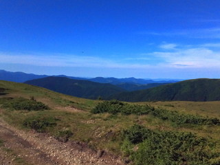 landscape with mountains and blue sky