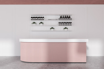 White bar interior with pink counter