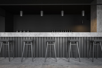 Interior of dark loft style pub with bar counter