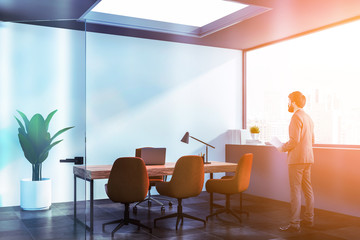 Businessman in modern white office