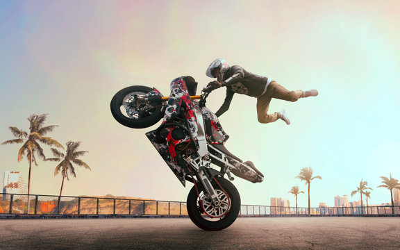 Moto rider making a stunt on his motorbike. Biker doing a difficult and dangerous stunt.