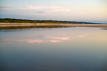Baltic sea, perfect reflection, forest during sunset