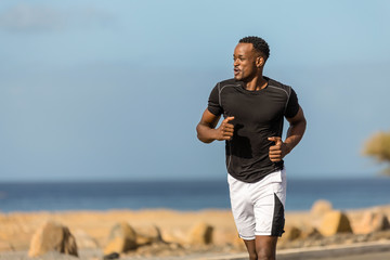 Black african american young man running outdoor