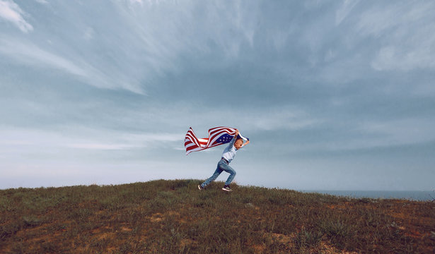 teen boy with american flag