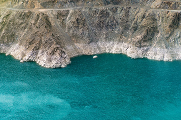 Obraz premium The fantastic view of the river and the mountain road.
