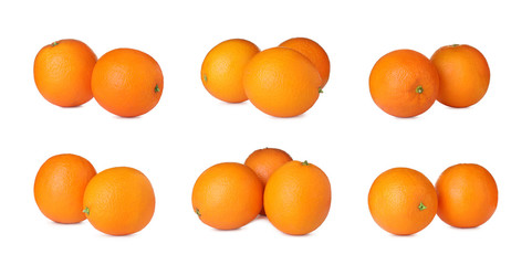 Set of ripe juicy oranges on white background
