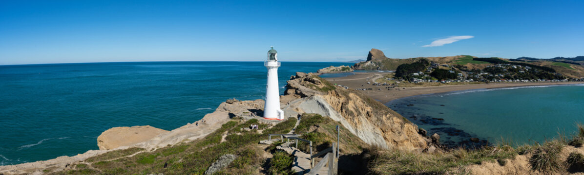 Castlepoint Lighthouse in the Wairarapa, New Zealand on a clear sunny day