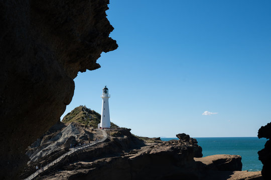 Castlepoint Lighthouse in the Wairarapa, New Zealand on a clear sunny day