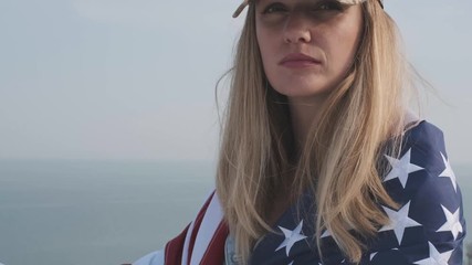 female soldier with american flag