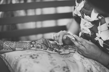 Indian bride's henna mehndi mehendi hands close up