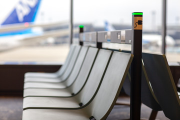 Empty seat in the airport terminal lounge.