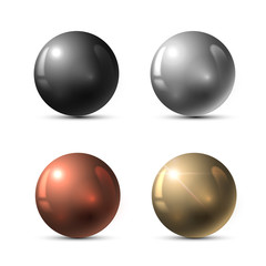 A set of metal balls on a white background: black, silver, bronze, gold