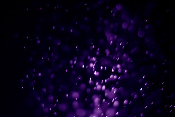 Bokeh purple proton background abstract